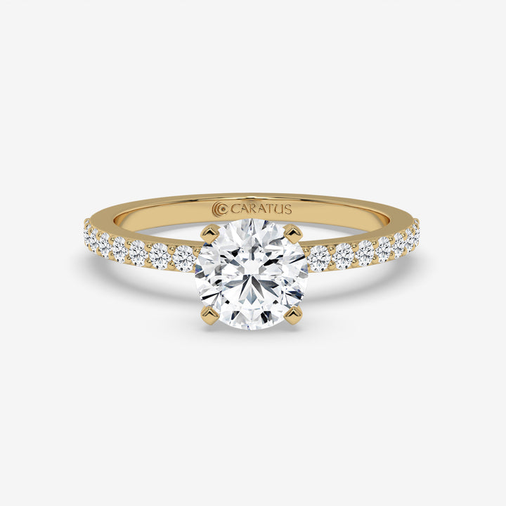 Cushion-cut diamond Ring with Channel-Side Diamonds in Yellow Gold