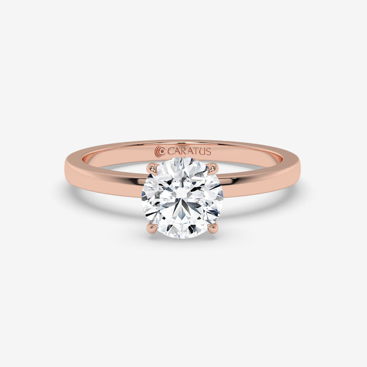 Round Diamond Ring with Accent Diamonds in Rose Gold