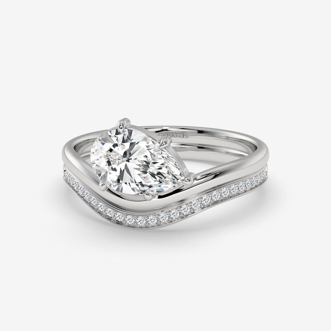 Pear-Shaped Diamond Ring with Round Diamonds in Rose Gold