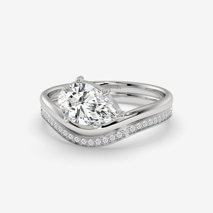 Pear-Shaped Diamond Ring with Round Diamonds in White Gold