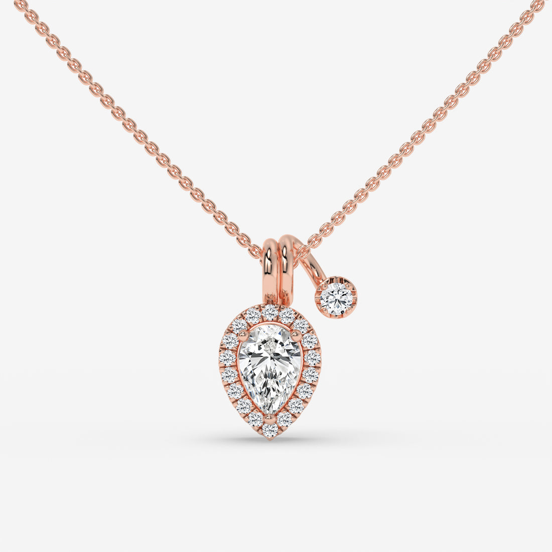 Pear-Shaped Diamond Pendant with Round Diamond Accent in Yellow Gold